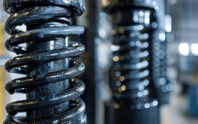 Ressorts de torsion et de traction pour porte de garage sectionnelle